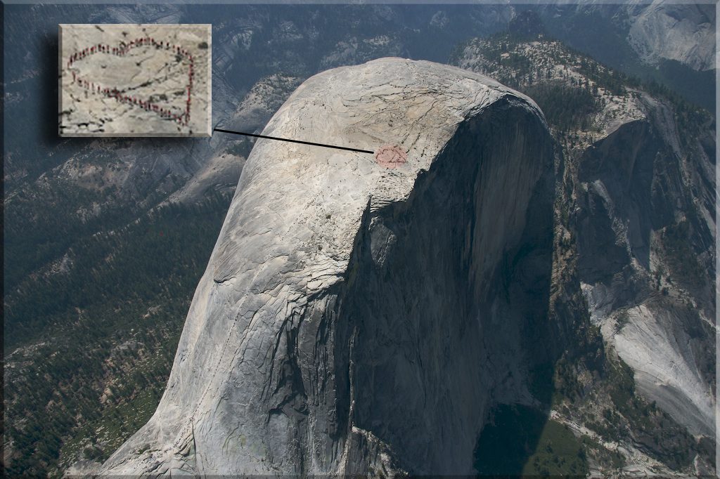 Aerial view of people forming heart on half dome mountain